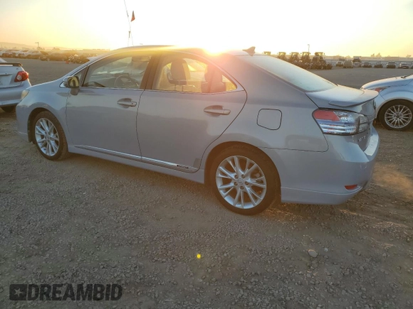 2010 Lexus HS 250h with VIN JTHBB1BA1A2013228, listed as a Copart auction lot 83495514 with 139,723 mi miles and Salvage Title. Bid and sale history available at DreamBid. Image 2.