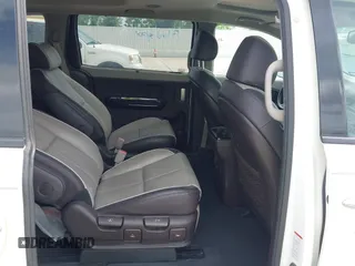 2015 Kia Sedona SX-L with VIN KNDME5C12F6028893, listed as a IAAI auction lot 42109514 with 169,303 mi miles and . Bid and sale history available at DreamBid. Image 8.