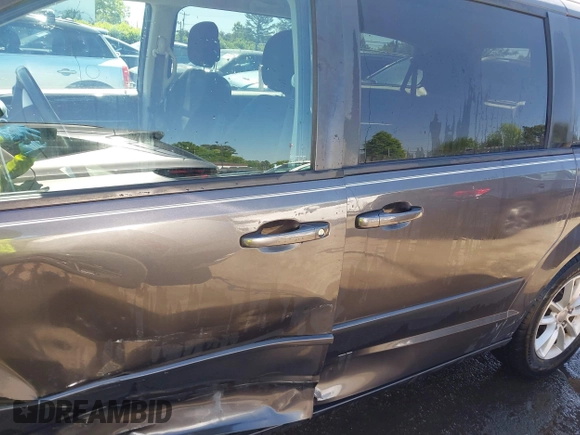 2015 Dodge Grand Caravan SXT with VIN 2C4RDGCG4FR631362, listed as a IAAI auction lot 42027066 with 149,599 mi miles and . Bid and sale history available at DreamBid. Image 17.