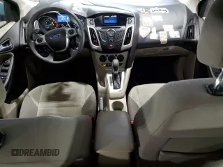 2012 Ford Focus SE with VIN 1FAHP3F27CL149328, listed as a Copart auction lot 56000325 with 147,097 mi miles and Salvage Title. Bid and sale history available at DreamBid. Image 8.