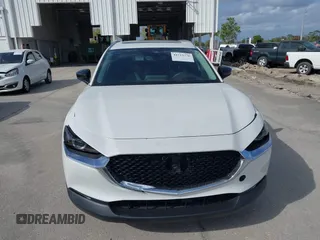 2022 Mazda CX-30 2.5 Turbo Premium Package with VIN 3MVDMBDY3NM437897, listed as a IAAI auction lot 41715776 with 42,771 mi miles. Bid and sale history available at carsss.com. Image 12.