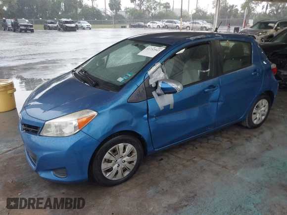 2013 Toyota Yaris L with VIN JTDKTUD33DD545913, listed as a IAAI auction lot 41752043 with 201,236 mi miles. Bid and sale history available at carsss.com. Image 2.