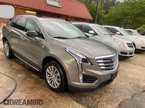 2019 Cadillac XT5 Luxury FWD with VIN 1GYKNCRS0KZ206086, listed as a Copart auction lot 54454825 with 93,621 mi miles and Salvage Title. Bid and sale history available at DreamBid. Image 1.