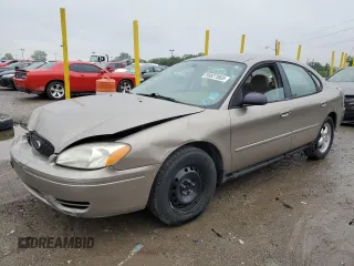2004 Ford Taurus SES with VIN 1FAFP55204G195842, listed as a Copart auction lot 59527065 with 120,744 mi miles and Salvage title. Bid and sale history available at DreamBid. Image 1.