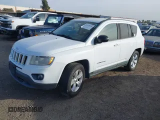 2011 Jeep Compass with VIN 1J4NT1FA5BD289644, listed as a IAAI auction lot 41320876 with 149,938 mi miles. Bid and sale history available at carsss.com. Image 2.