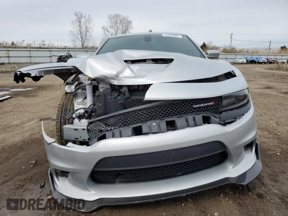 2021 Dodge Charger R/T with VIN 2C3CDXCT7MH594513, listed as a Copart auction lot 52482085 with 62,694 mi miles and Salvage Title. Bid and sale history available at carsss.com. Image 5.