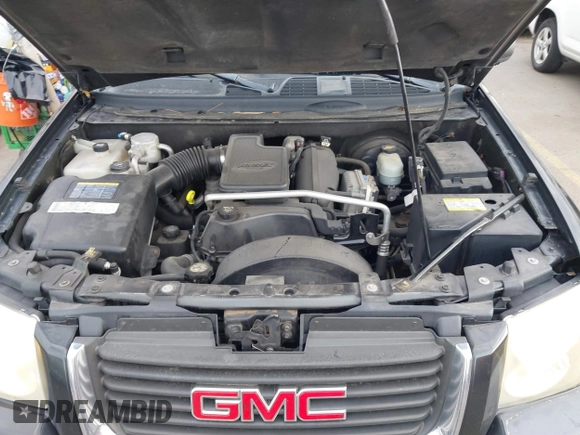 2005 GMC Envoy SLT with VIN 1GKDT13S352258833, listed as a IAAI auction lot 41525149 with 213,829 mi miles. Bid and sale history available at carsss.com. Image 10.