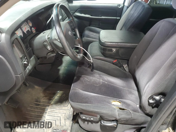2004 Dodge 2500 SLT z VIN 3D7KU28C24G210761, wystawiony jako Copart lot #57334965 z przebiegiem 186 989 mil mil oraz Czysty tytuł • Clean title. Historia ofert i sprzedaży dostępna na DreamBid. Obrazek 7.