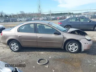 2001 Dodge Neon Highline z VIN 1B3ES46C71D183823, wystawiony jako IAAI lot #41521042 z przebiegiem 141 152 mil mil oraz . Historia ofert i sprzedaży dostępna na DreamBid. Obrazek 13.