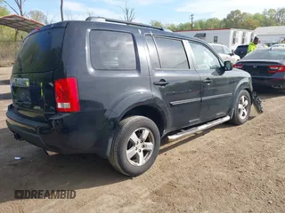 2011 Honda Pilot EX-L with VIN 5FNYF4H63BB004288, listed as a IAAI auction lot 42084984 with 215,019 mi miles and . Bid and sale history available at carsss.com. Image 4.