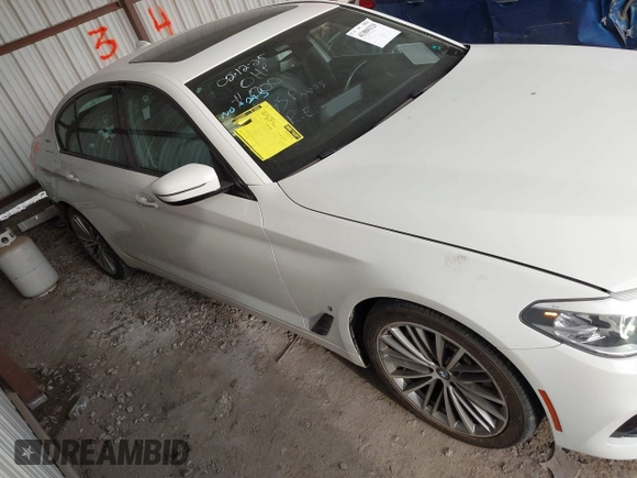 2018 BMW 5 Series 530e with VIN WBAJA9C57JB034128, listed as a IAAI auction lot 41800329 with 66,684 mi miles and . Bid and sale history available at DreamBid. Image 1.