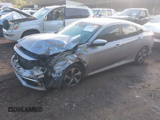 2020 Honda Civic LX z VIN 2HGFC2F60LH549739, wystawiony jako IAAI lot #40922240 z przebiegiem 127 958 mil mil oraz . Historia ofert i sprzedaży dostępna na DreamBid. Obrazek 17.
