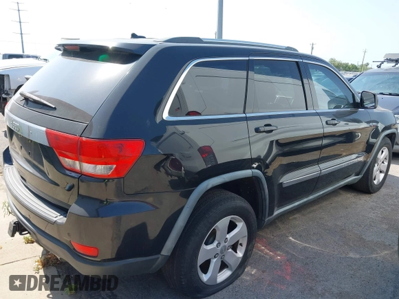 2011 Jeep Grand Cherokee Laredo with VIN 1J4RS4GG9BC524321, listed as a IAAI auction lot 42155167 with Not Provided miles and . Bid and sale history available at DreamBid. Image 4.