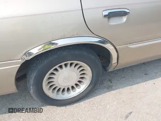 2000 Mercury Grand Marquis LS z VIN 2MEFM75W7YX729323, wystawiony jako IAAI lot #42475457 z przebiegiem 148 910 mil mil oraz . Historia ofert i sprzedaży dostępna na DreamBid. Obrazek 12.