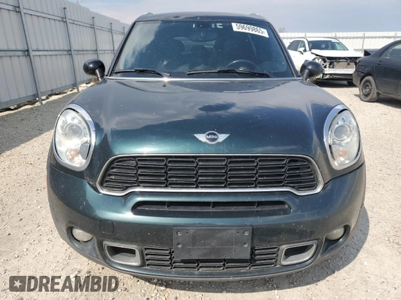 2012 MINI Countryman S with VIN WMWZC5C54CWL57554, listed as a Copart auction lot 59699865 with 144,737 mi miles and Salvage title. Bid and sale history available at DreamBid. Image 5.