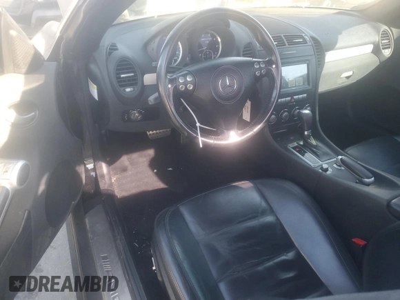 2006 Mercedes-Benz SLK-Class 5.5L AMG with VIN WDBWK73F16F093516, listed as a Copart auction lot 77485754 with 112,419 mi miles and Salvage Title. Bid and sale history available at carsss.com. Image 8.