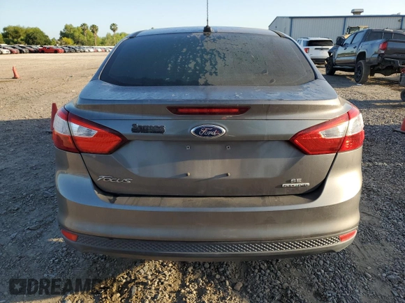 2013 Ford Focus SE z VIN 1FADP3F22DL233878, wystawiony jako Copart lot #52598475 z przebiegiem 131 539 mil mil oraz Szkoda całkowita • Salvage title. Historia ofert i sprzedaży dostępna na DreamBid. Obrazek 6.