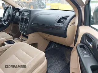 2014 Dodge Grand Caravan SXT z VIN 2C4RDGCGXER322705, wystawiony jako IAAI lot #42450791 z przebiegiem 147 113 mil mil oraz . Historia ofert i sprzedaży dostępna na DreamBid. Obrazek 5.