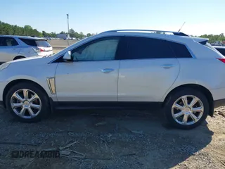 2013 Cadillac SRX Performance Collection with VIN 3GYFNHE31DS597987, listed as a IAAI auction lot 42319058 with 139,670 mi miles and . Bid and sale history available at DreamBid. Image 14.