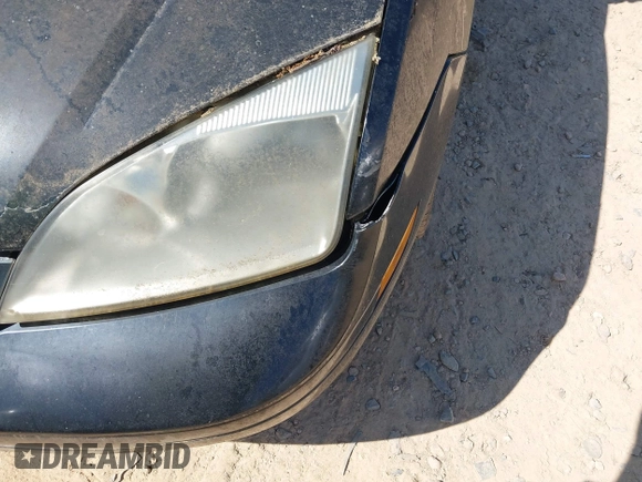 2006 Ford Focus S z VIN 1FAFP31N76W249134, wystawiony jako IAAI lot #41951073 z przebiegiem 152 065 mil mil oraz . Historia ofert i sprzedaży dostępna na DreamBid. Obrazek 17.