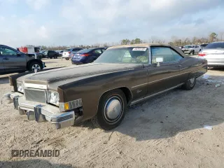 1974 Cadillac Eldorado z VIN 6L67S4Q433462, wystawiony jako Copart lot #44255105 z przebiegiem 94 539 mil mil oraz Czysty tytuł • Clean title. Historia ofert i sprzedaży dostępna na DreamBid. Obrazek 1.
