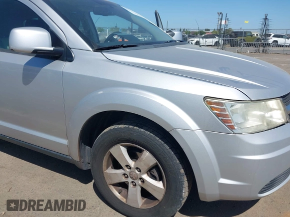 2009 Dodge Journey SXT with VIN 3D4GG57V19T211770, listed as a IAAI auction lot 42095045 with 164,610 mi miles. Bid and sale history available at carsss.com. Image 6.