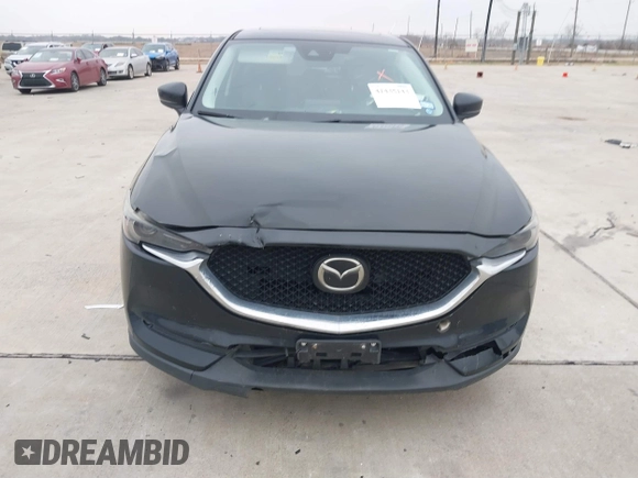2017 Mazda CX-5 Grand Touring with VIN JM3KFADL9H0110985, listed as a IAAI auction lot 41435143 with 88,208 mi miles. Bid and sale history available at carsss.com. Image 12.