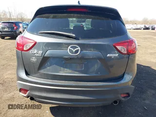 2013 Mazda CX-5 Grand Touring with VIN JM3KE4DE1D0164488, listed as a IAAI auction lot 41683326 with 129,989 mi miles. Bid and sale history available at carsss.com. Image 16.