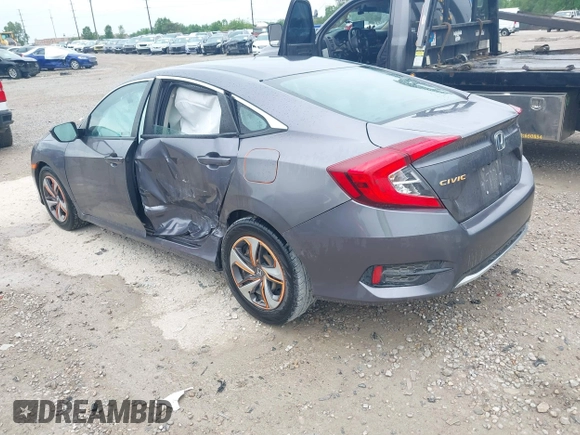 2020 Honda Civic LX z VIN 19XFC2F66LE012481, wystawiony jako IAAI lot #42297600 z przebiegiem 56 602 mil mil oraz . Historia ofert i sprzedaży dostępna na DreamBid. Obrazek 3.