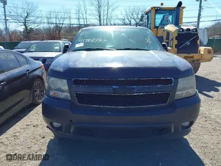 2009 Chevrolet Suburban LT w/1LT with VIN 1GNFK26309R273831, listed as a IAAI auction lot 41766177 with 999,999 mi miles. Bid and sale history available at carsss.com. Image 11.