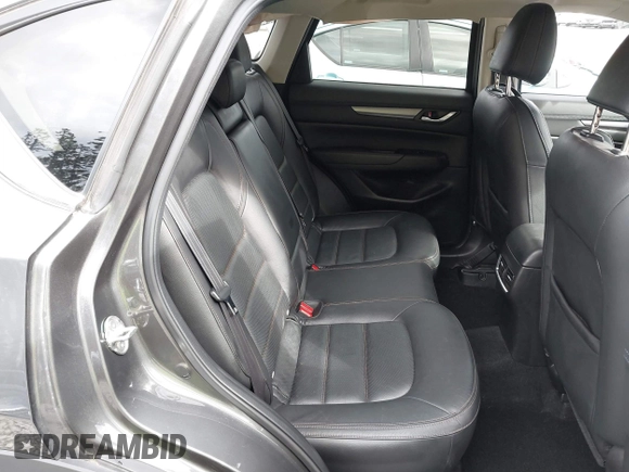 2021 Mazda CX-5 Touring with VIN JM3KFBCM2M0484011, listed as a IAAI auction lot 41825954 with 48,958 mi miles. Bid and sale history available at carsss.com. Image 8.
