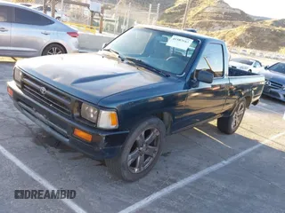1994 Toyota Pickup with VIN JT4RN81A2R5194383, listed as a IAAI auction lot 41587661 with 262,153 mi miles and . Bid and sale history available at DreamBid. Image 2.