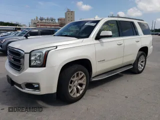 2015 GMC Yukon SLT z VIN 1GKS1BKC4FR552523, wystawiony jako Copart lot #54658135 z przebiegiem 93 907 mil mil oraz Czysty tytuł • Clean title. Historia ofert i sprzedaży dostępna na DreamBid. Obrazek 1.