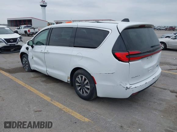 2023 Chrysler Pacifica Hybrid Touring L z VIN 2C4RC1L74PR540870, wystawiony jako IAAI lot #42056528 z przebiegiem 46 940 mil mil oraz . Historia ofert i sprzedaży dostępna na DreamBid. Obrazek 3.