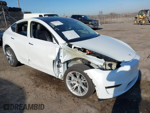 2023 Tesla Model Y Long Range z VIN 7SAYGDEE5PF765326, wystawiony jako IAAI lot #41757113 z przebiegiem 10 461 mil mil oraz . Historia ofert i sprzedaży dostępna na DreamBid. Obrazek 1.
