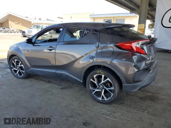 2018 Toyota C-HR XLE with VIN NMTKHMBXXJR025925, listed as a Copart auction lot 60121105 with 107,081 mi miles and Salvage title. Bid and sale history available at DreamBid. Image 2.