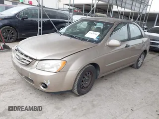 2004 Kia Spectra LX with VIN KNAFE121245064294, listed as a IAAI auction lot 41424241 with 110,136 mi miles. Bid and sale history available at carsss.com. Image 17.