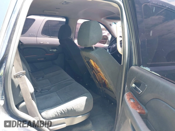 2007 Chevrolet Tahoe LT z VIN 1GNFC13J87R199940, wystawiony jako IAAI lot #42110497 z przebiegiem Nie podano mil oraz . Historia ofert i sprzedaży dostępna na DreamBid. Obrazek 8.