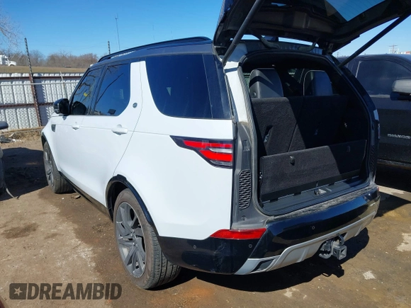 2017 Land Rover Discovery HSE Luxury z VIN SALRHBBV2HA037084, wystawiony jako IAAI lot #41669255 z przebiegiem 136 651 mil mil oraz . Historia ofert i sprzedaży dostępna na DreamBid. Obrazek 3.