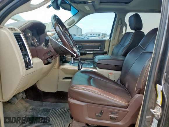 2016 Ram 2500 Laramie Longhorn with VIN 3C6UR5GL9GG173047, listed as a Copart auction lot 64480445 with 121,535 mi miles and Salvage title. Bid and sale history available at DreamBid. Image 7.