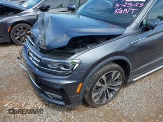 2018 Volkswagen Tiguan SEL Premium with VIN 3VV5B7AX4JM201579, listed as a IAAI auction lot 41932201 with 118,728 mi miles and . Bid and sale history available at DreamBid. Image 6.