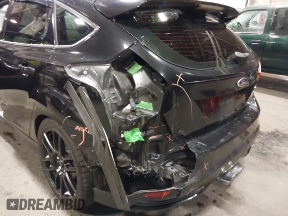 2014 Ford Focus ST with VIN 1FADP3L96EL355713, listed as a IAAI auction lot 41572939 with 102,838 mi miles and . Bid and sale history available at carsss.com. Image 6.