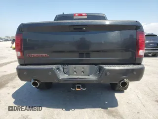 2016 Ram 1500 Rebel z VIN 1C6RR7YT1GS350439, wystawiony jako Copart lot #52300885 z przebiegiem 196 557 mil mil oraz Szkody całkowita. Historia ofert i sprzedaży dostępna na DreamBid. Obrazek 6.