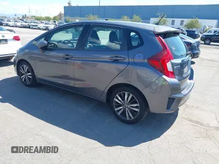 2015 Honda Fit EX-L z VIN 3HGGK5H86FM746265, wystawiony jako IAAI lot #42253205 z przebiegiem 75 491 mil mil oraz . Historia ofert i sprzedaży dostępna na DreamBid. Obrazek 3.