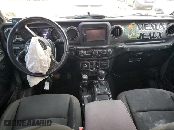 2020 Jeep Gladiator Sport S with VIN 1C6HJTAG9LL127546, listed as a Copart auction lot 54955945 with 99,511 mi miles and Salvage title. Bid and sale history available at DreamBid. Image 8.