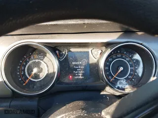 2021 Jeep Gladiator Sport S with VIN 1C6JJTAG4ML599463, listed as a IAAI auction lot 41312938 with 169,189 mi miles. Bid and sale history available at carsss.com. Image 7.