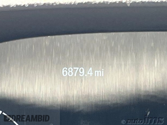 2023 Ford Transit Cargo z VIN 1FTBR1X80PKC02609, wystawiony jako IAAI lot #42845487 z przebiegiem 6 879 mil mil oraz . Historia ofert i sprzedaży dostępna na DreamBid. Obrazek 4.
