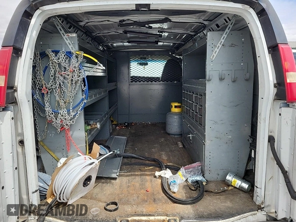 2015 Chevrolet Express Cargo with VIN 1GCZGTCG7F1172459, listed as a IAAI auction lot 42836177 with 156,729 mi miles and . Bid and sale history available at DreamBid. Image 33.
