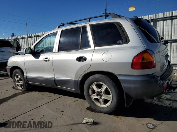 2002 Hyundai Santa Fe GLS with VIN KM8SC13D02U311312, listed as a Copart auction lot 85943534 with 307,758 mi miles and Salvage Title. Bid and sale history available at carsss.com. Image 2.