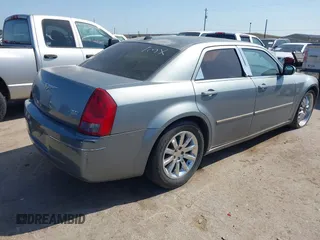 2006 Chrysler 300 Touring with VIN 2C3KA53G06H172162, listed as a IAAI auction lot 42005963 with 209,549 mi miles. Bid and sale history available at carsss.com. Image 4.